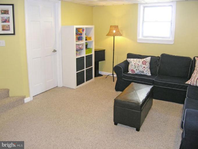 2005 Hanover Street Silver Spring, MD 20910 - Photo 11 of 28 a bedroom with furniture and a window