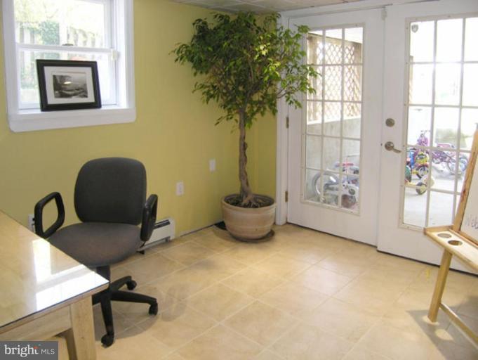 2005 Hanover Street Silver Spring, MD 20910 - Photo 14 of 28 a view of a workspace with furniture and a window