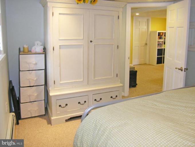2005 Hanover Street Silver Spring, MD 20910 - Photo 17 of 28 a bedroom with a bed and a cabinets