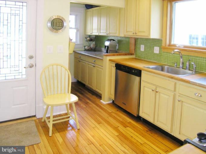 2005 Hanover Street Silver Spring, MD 20910 - Photo 5 of 28 a kitchen with a sink cabinets and window