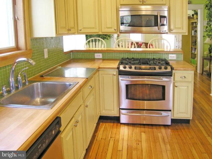 2005 Hanover Street Silver Spring, MD 20910 - Photo 6 of 28 a kitchen with a stove and a sink
