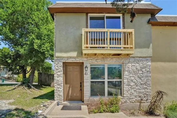 a house view with a garden space