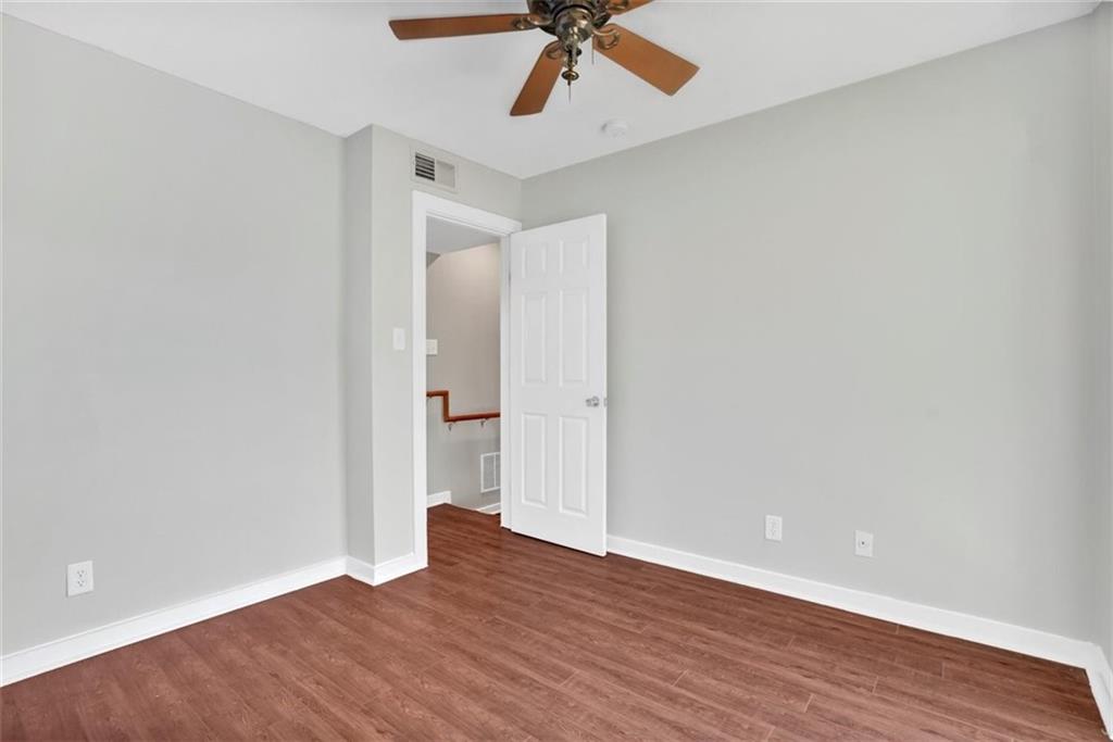 2000 Lightsey Road, Unit 1 Austin, TX 78704 - Photo 11 of 19 wooden floor in an empty room