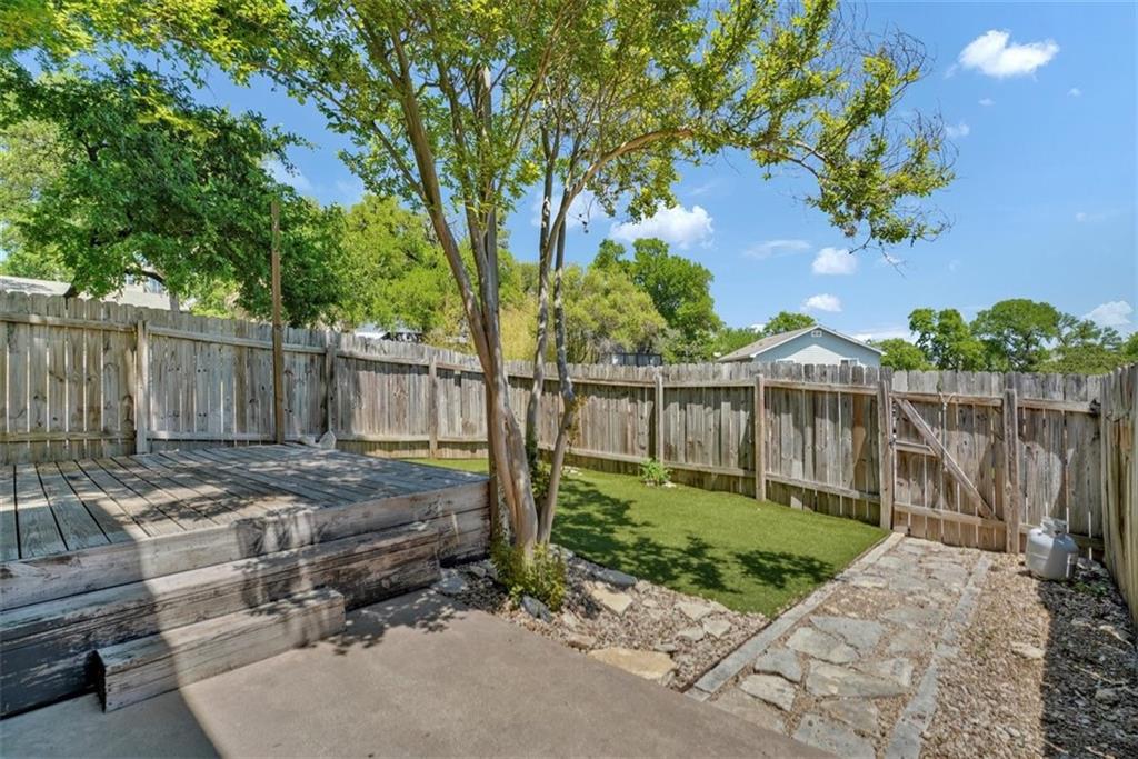 2000 Lightsey Road, Unit 1 Austin, TX 78704 - Photo 16 of 19 a view of backyard with wooden fence