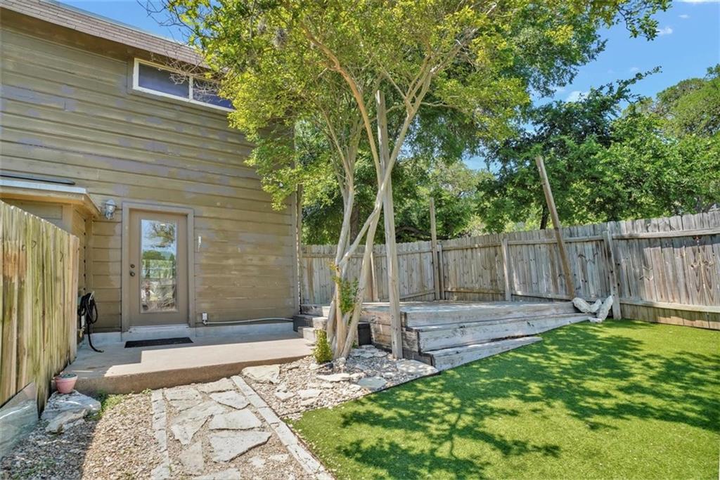 2000 Lightsey Road, Unit 1 Austin, TX 78704 - Photo 17 of 19 a view of a backyard with a small cabin
