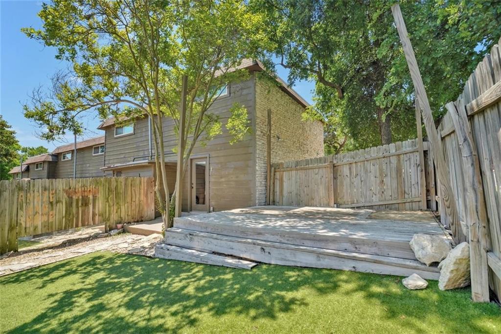 2000 Lightsey Road, Unit 1 Austin, TX 78704 - Photo 18 of 19 a view of a backyard with a tree