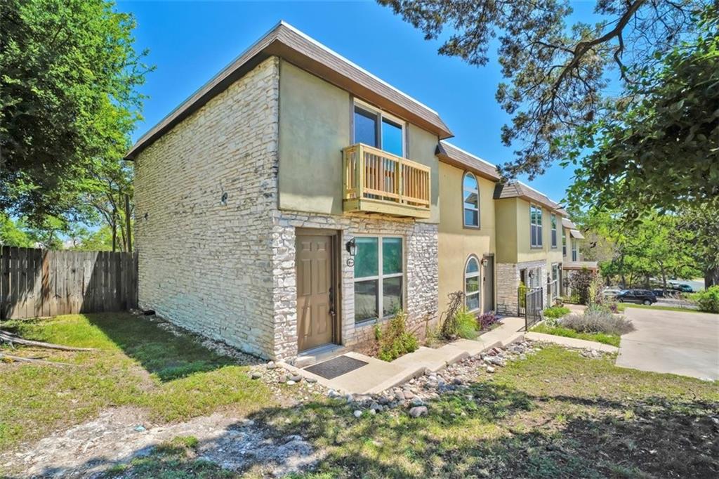 2000 Lightsey Road, Unit 1 Austin, TX 78704 - Photo 2 of 19 a view of a yard in front of a house