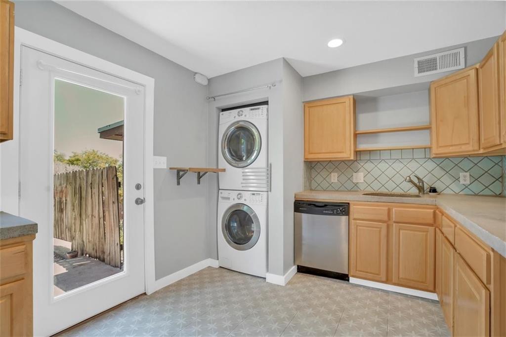 2000 Lightsey Road, Unit 1 Austin, TX 78704 - Photo 8 of 19 a utility room with sink dryer and washer