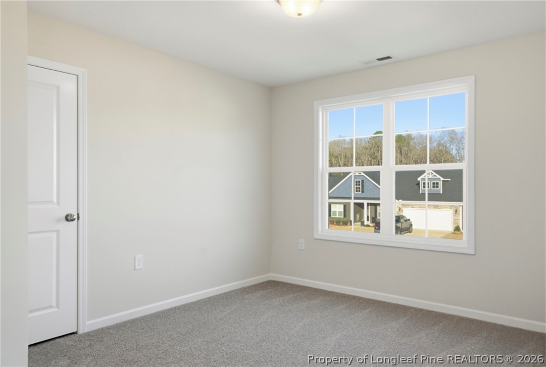 106 Knotts Berry Road Bunnlevel, NC 28323 - Photo 43 of 50 an empty room with a window