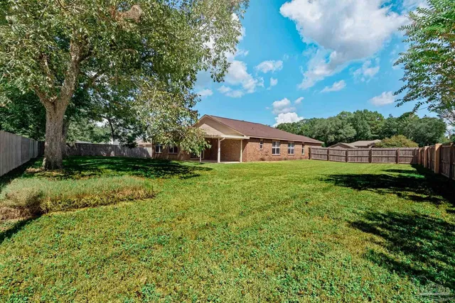 a view of outdoor space and yard