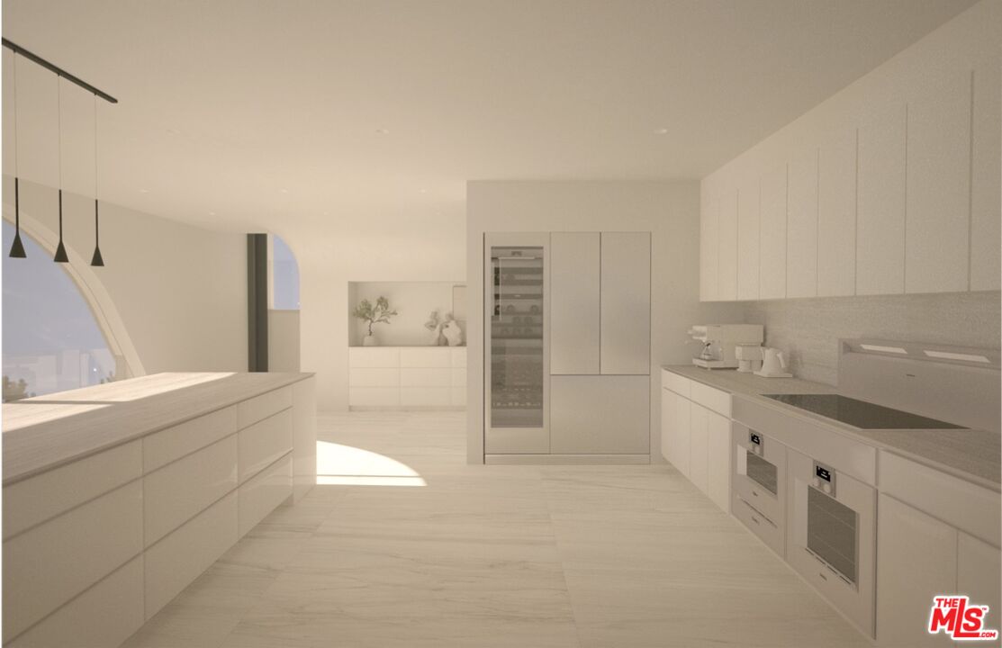 1 Eldermoor Drive Malibu, CA 90265 - Photo 14 of 23 a large white kitchen with cabinetry a sink and dishwasher