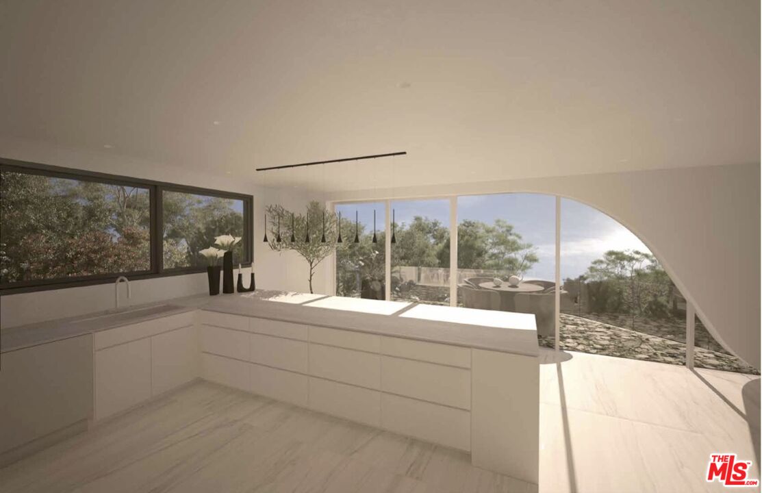 1 Eldermoor Drive Malibu, CA 90265 - Photo 15 of 23 a room with a bed and large window