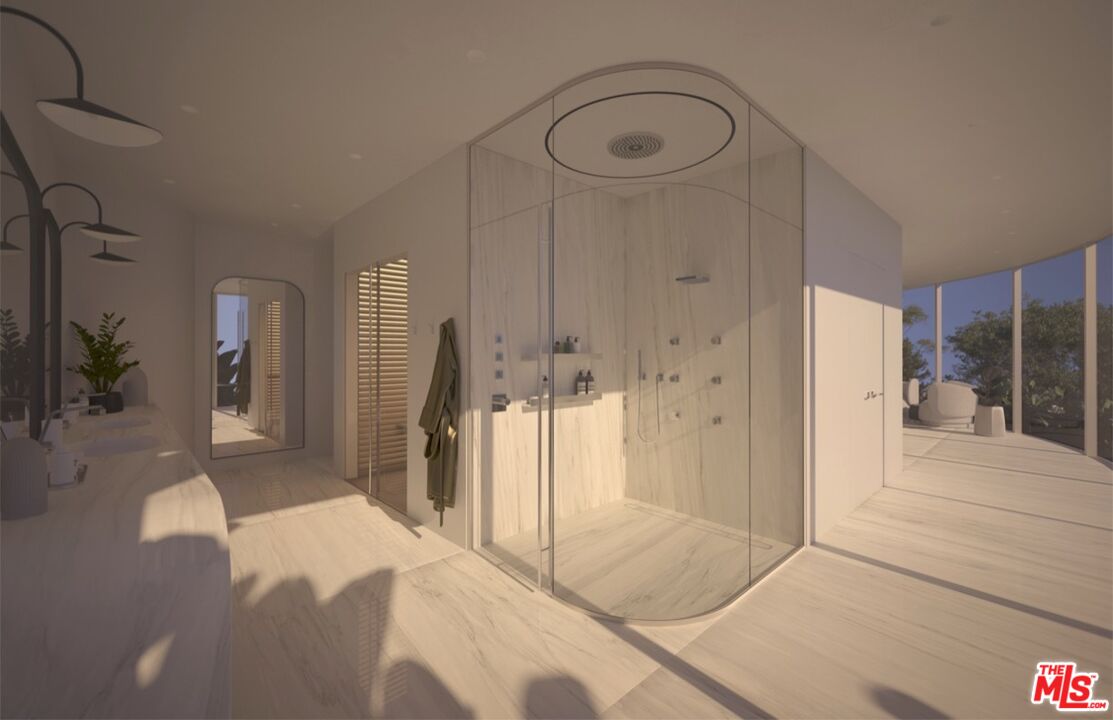 1 Eldermoor Drive Malibu, CA 90265 - Photo 19 of 23 a spacious bathroom with a shower and a mirror