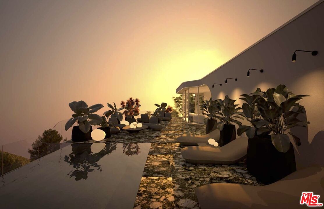 1 Eldermoor Drive Malibu, CA 90265 - Photo 6 of 23 a view of a vase of flowers sitting on a table