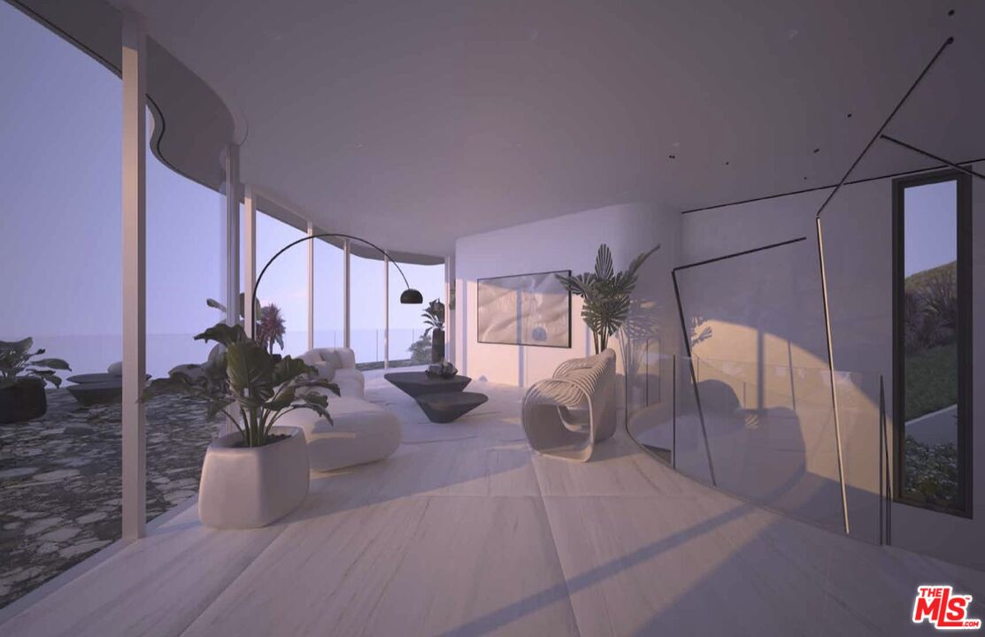 1 Eldermoor Drive Malibu, CA 90265 - Photo 7 of 23 a lobby with furniture and a flat screen tv