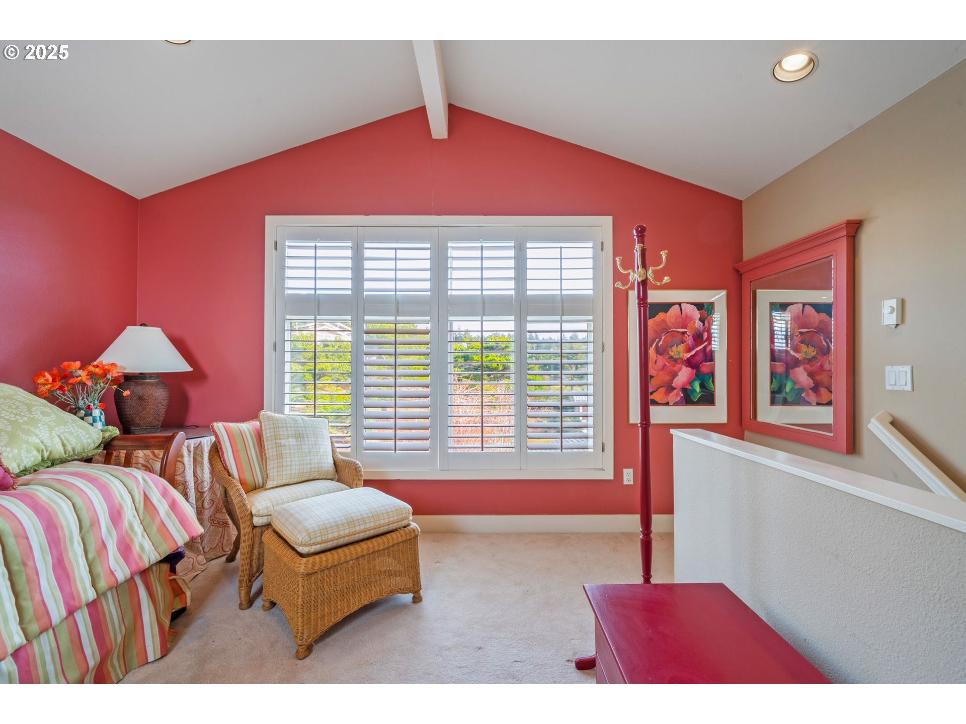 5235 Capes Loop Oceanside, OR 97141 - Photo 17 of 48 a bedroom with furniture and a large window