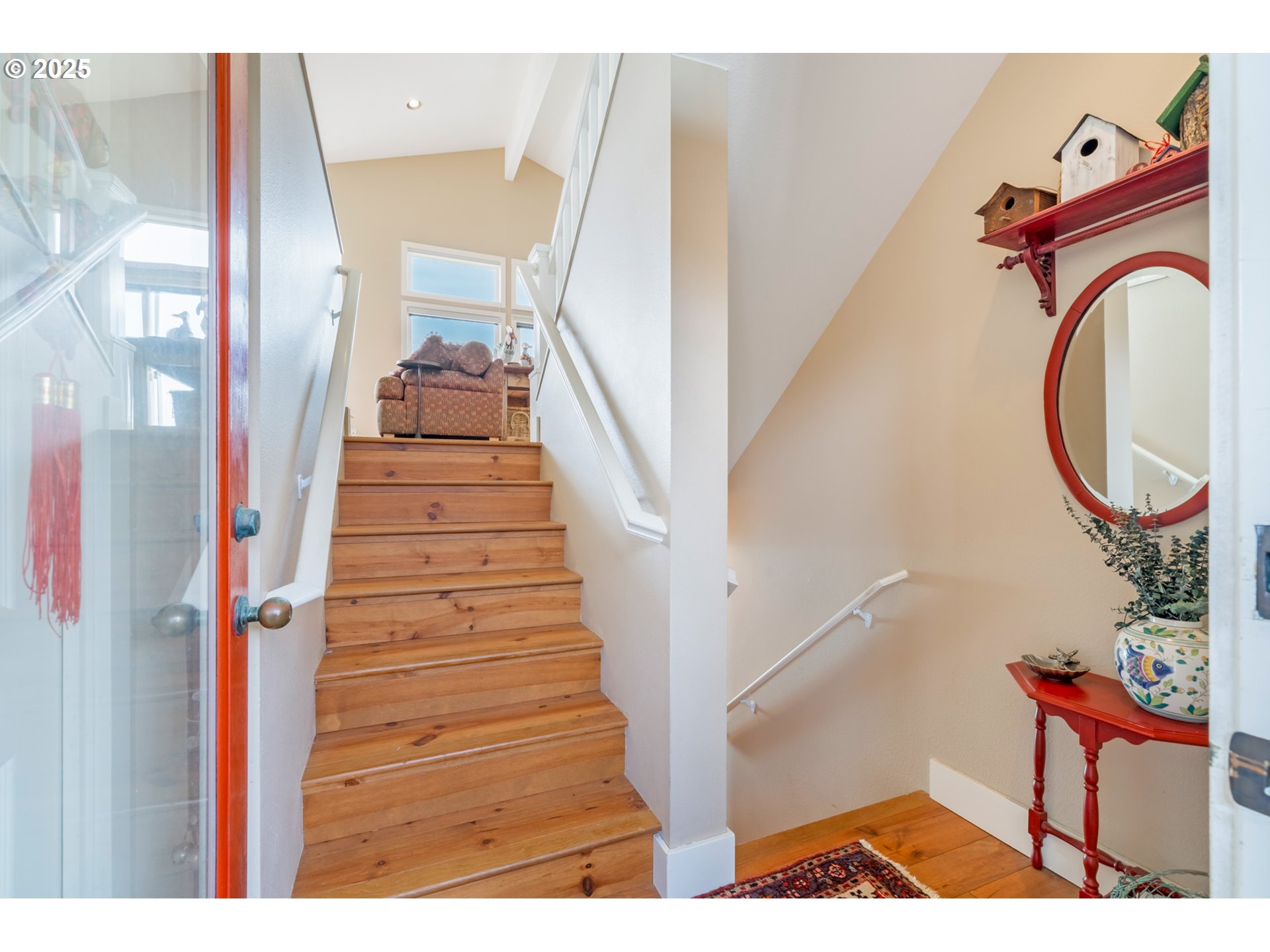 5235 Capes Loop Oceanside, OR 97141 - Photo 19 of 48 a view of entryway and hall with wooden floor