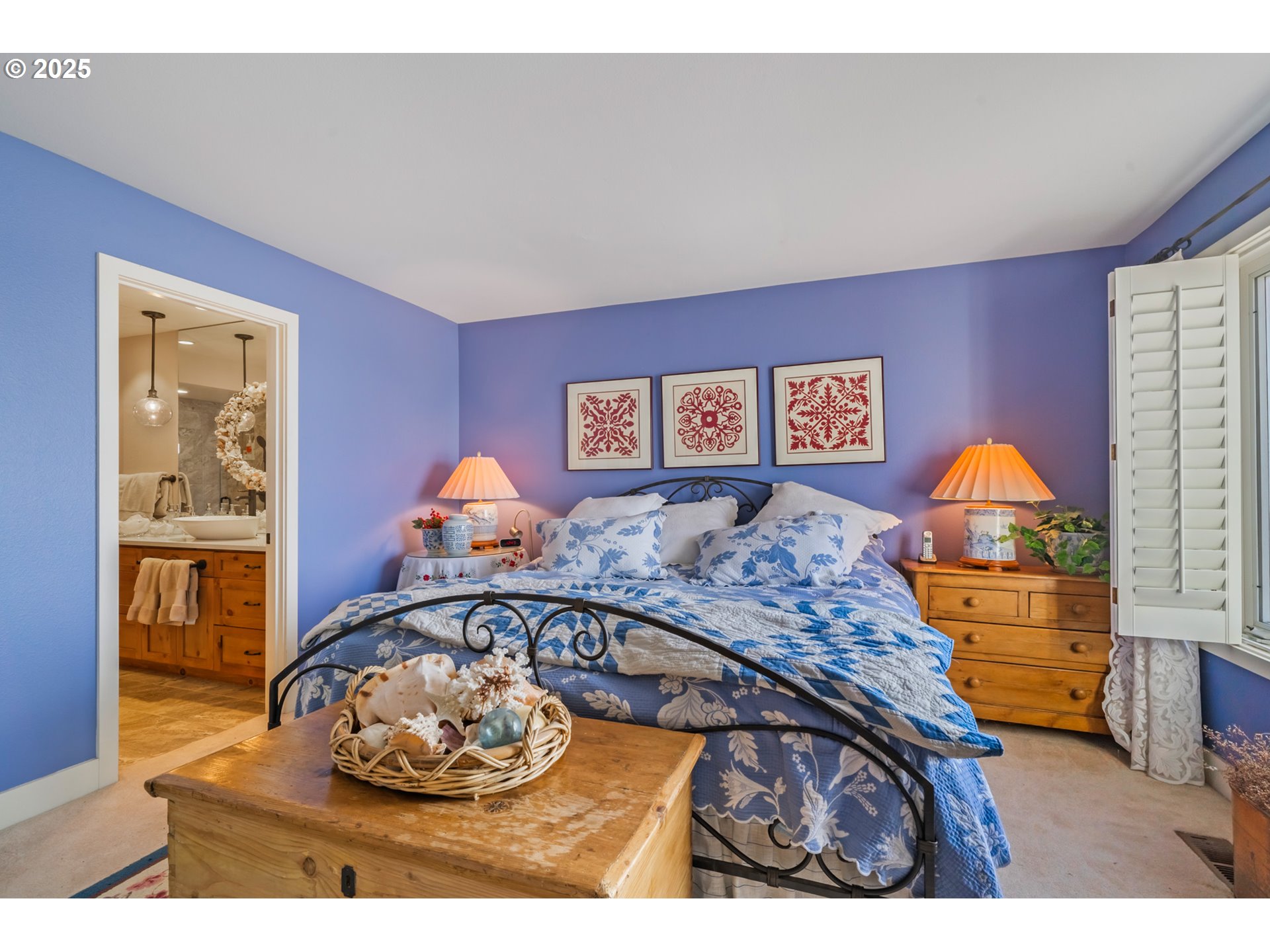 5235 Capes Loop Oceanside, OR 97141 - Photo 23 of 48 a bedroom with a bed mirror and a desk