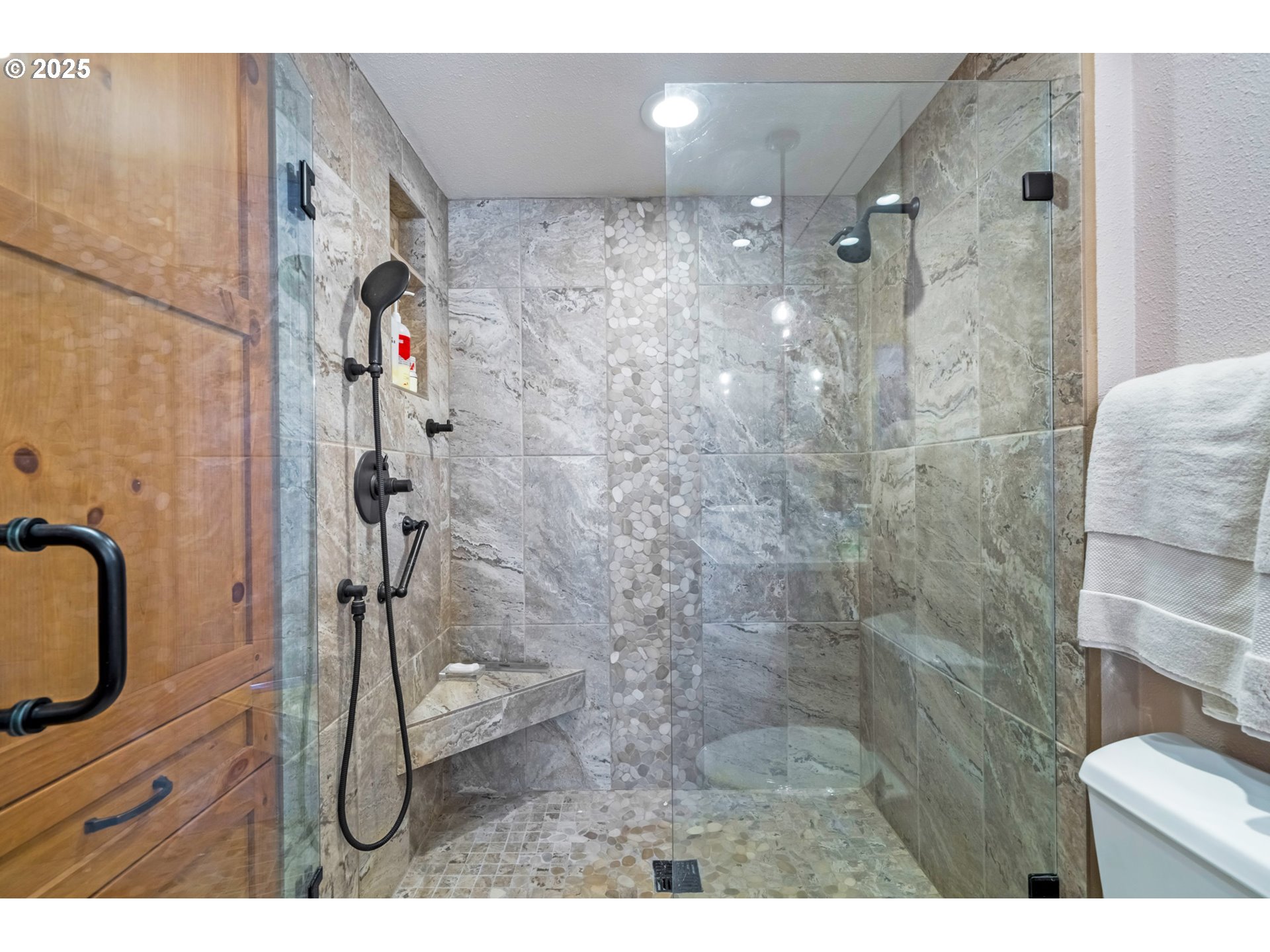 5235 Capes Loop Oceanside, OR 97141 - Photo 26 of 48 a bathroom with a shower