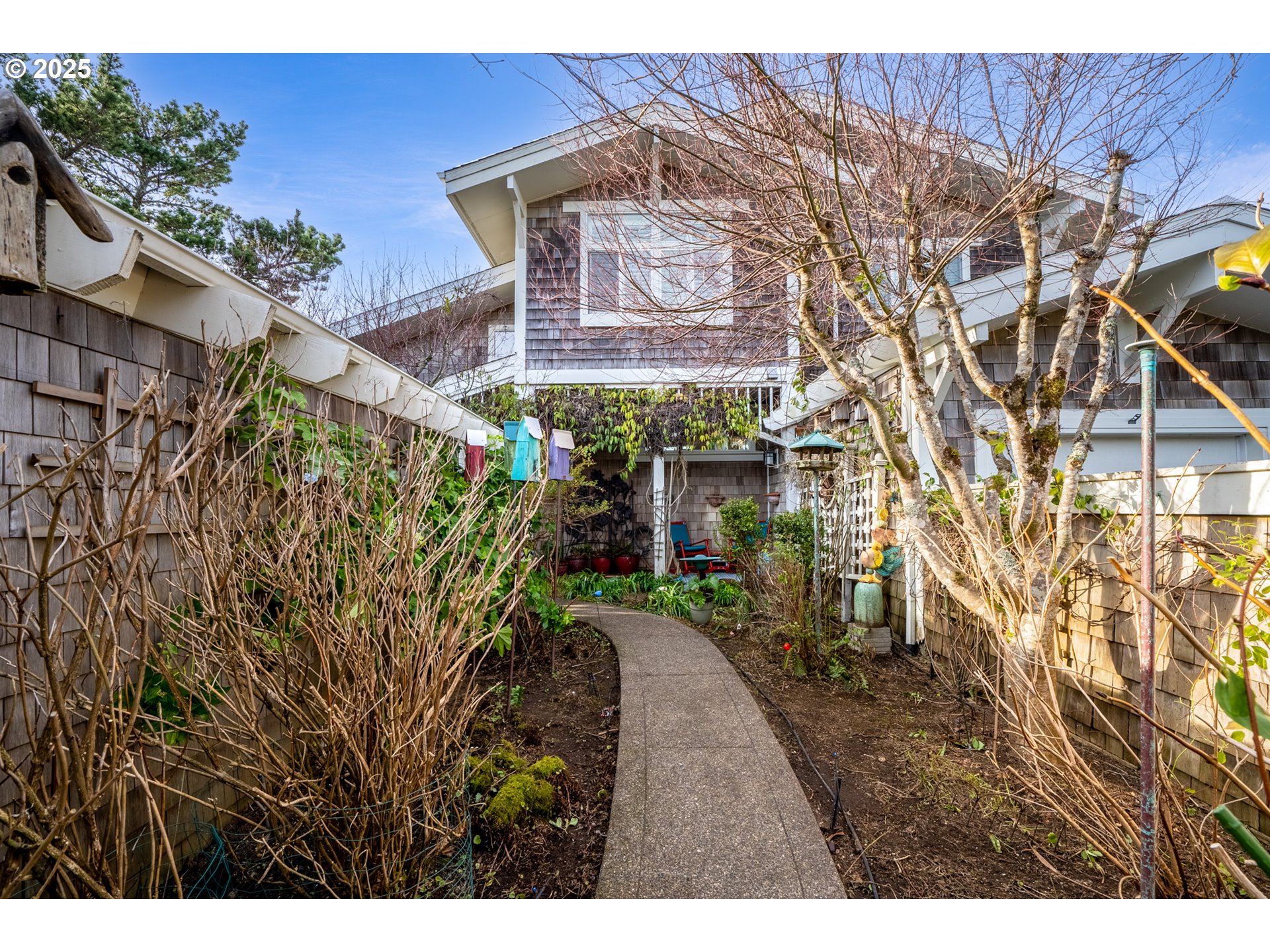 5235 Capes Loop Oceanside, OR 97141 - Photo 37 of 48 a view of a backyard with plants