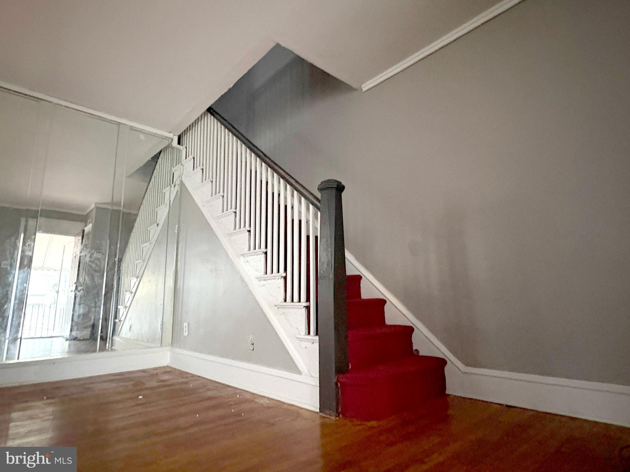233 Barrington Road Upper Darby, PA 19082 - Photo 3 of 14 a view of staircase with wooden floor and stairs