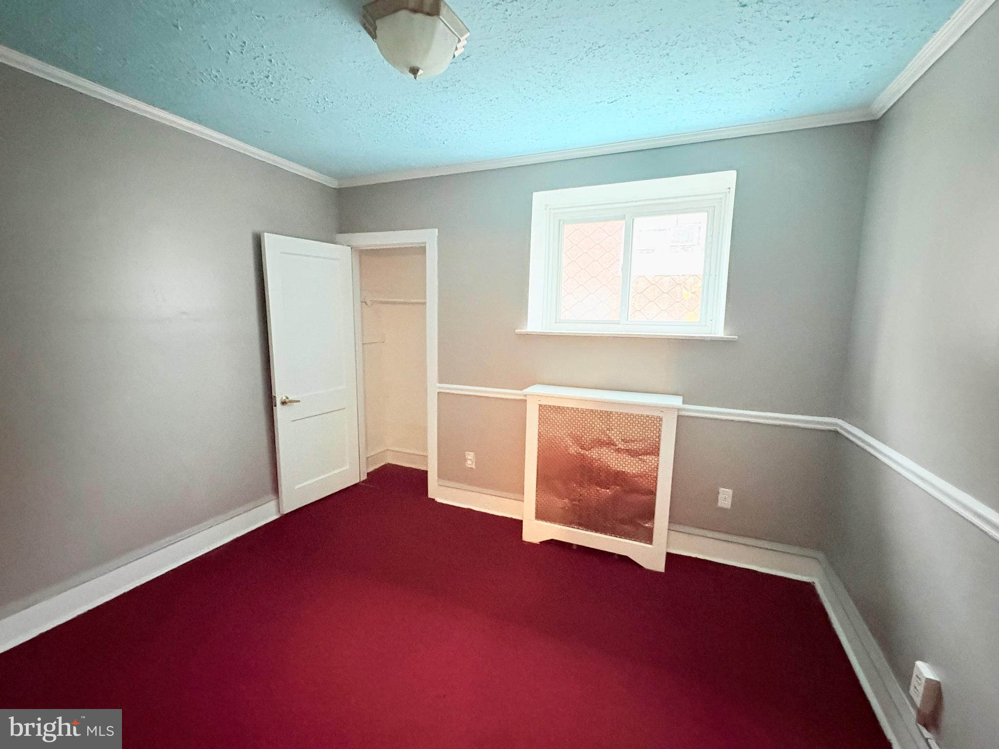 233 Barrington Road Upper Darby, PA 19082 - Photo 6 of 14 an empty room with windows