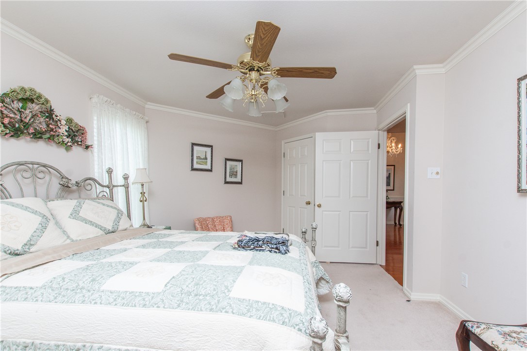 3521 FM 438 Loop Temple, TX 76501 - Photo 25 of 32 a bedroom with a bed and a chandelier