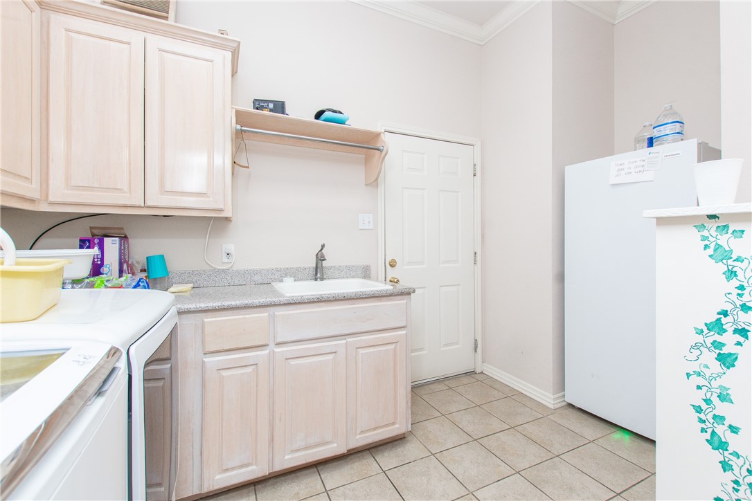 3521 FM 438 Loop Temple, TX 76501 - Photo 31 of 32 a kitchen with a sink and cabinets