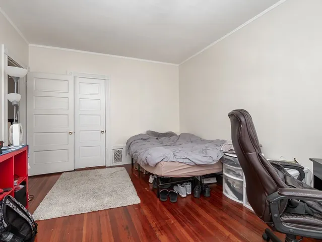a workspace with furniture and wooden floor