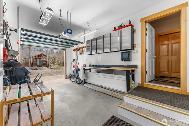 a view of a house with backyard porch and sitting area