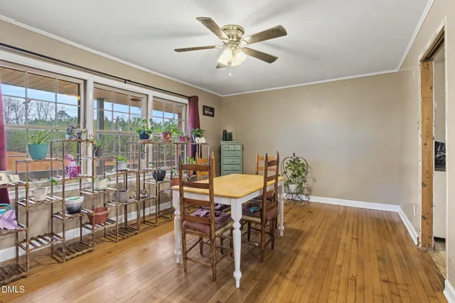 a kitchen with stainless steel appliances a refrigerator and a stove top oven