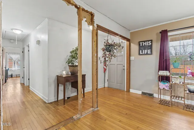a utility room with cabinets washer and dryer