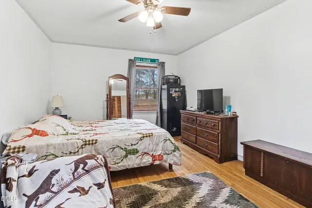a bedroom with furniture and windows