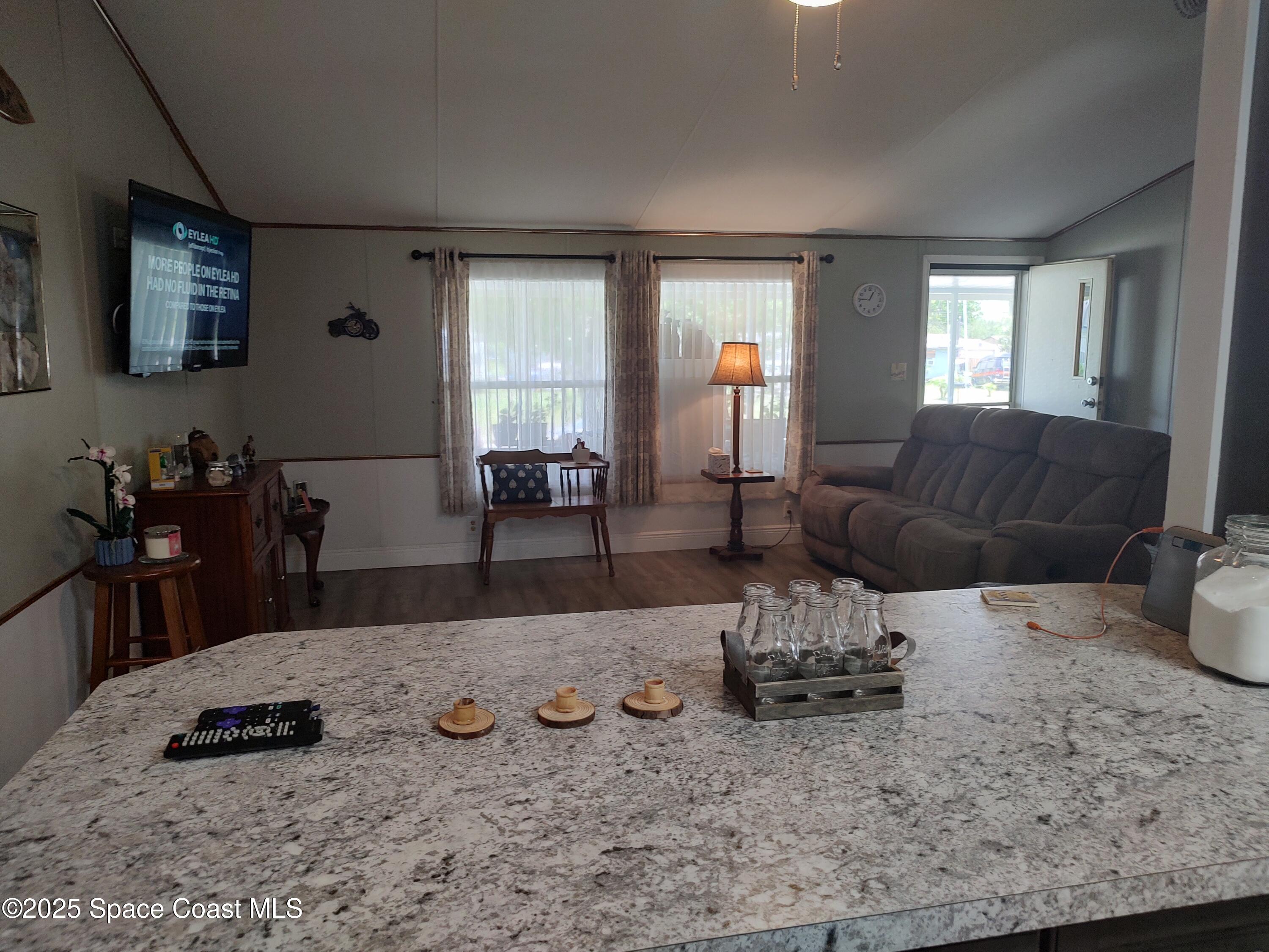 3314 Nab Street Mims, FL 32754 - Photo 8 of 27 a living room with furniture and wooden floor