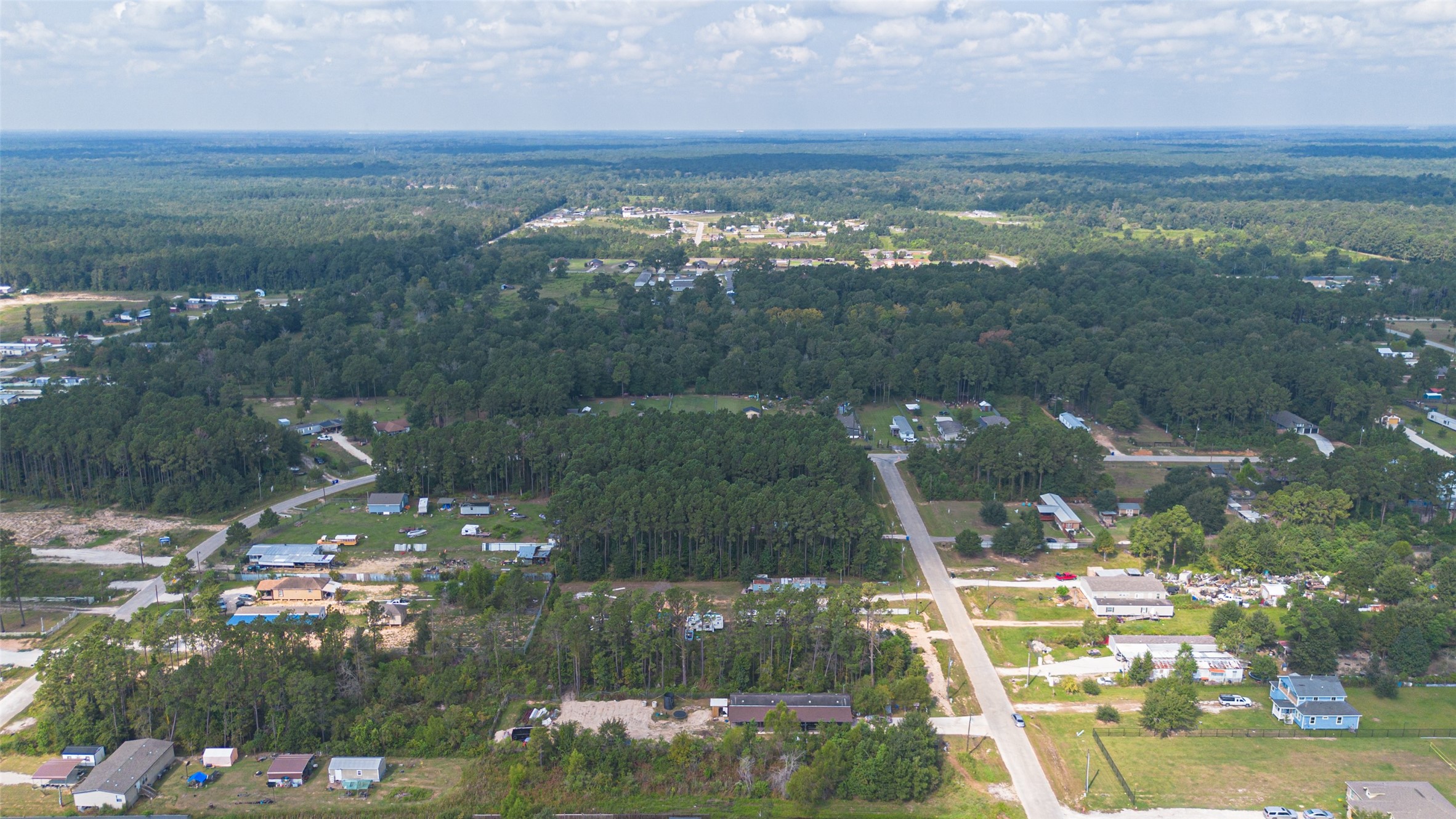 128 County Road 3548 Cleveland, TX 77327 - Photo 10 of 14 a view of a city
