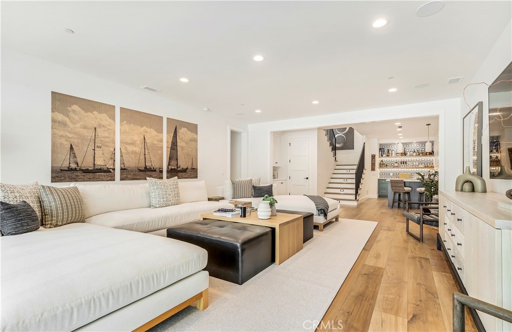 625 St James Road Newport Beach, CA 92663 - Photo 19 of 47 a living room with furniture and a large window