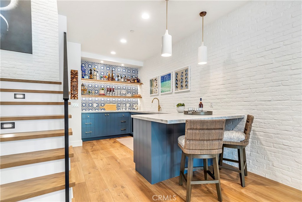 625 St James Road Newport Beach, CA 92663 - Photo 20 of 47 a kitchen with a sink cabinets and window