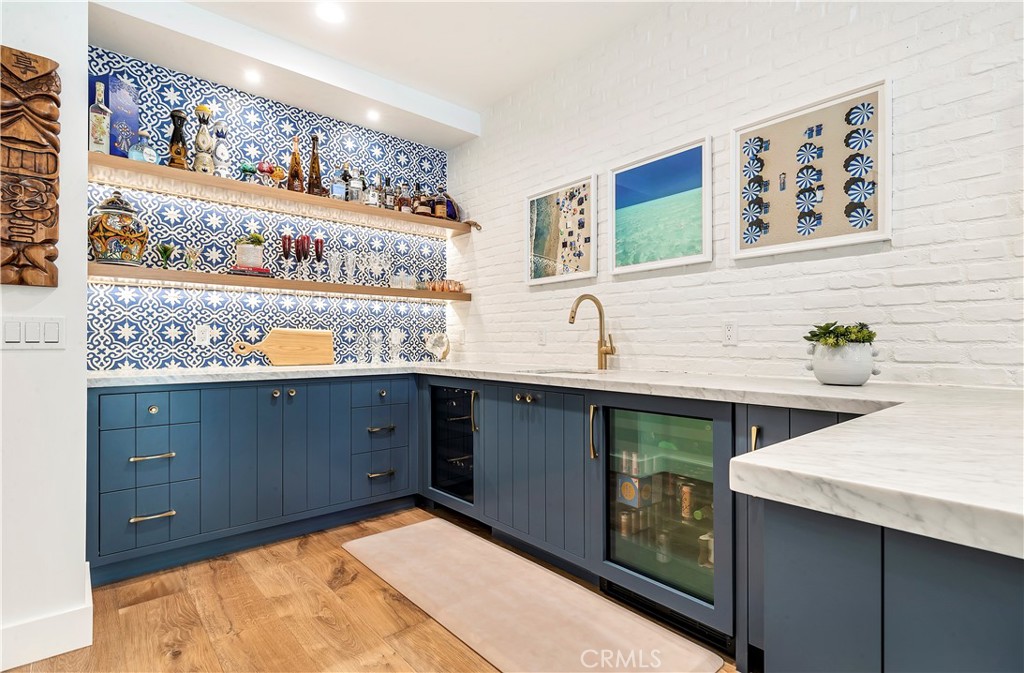 625 St James Road Newport Beach, CA 92663 - Photo 21 of 47 a kitchen with stainless steel appliances a cabinets and sink