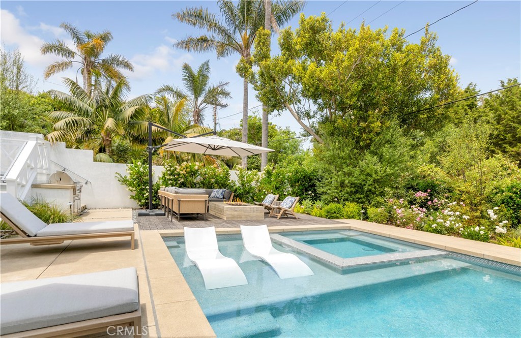 625 St James Road Newport Beach, CA 92663 - Photo 24 of 47 a view of a swimming pool with a patio