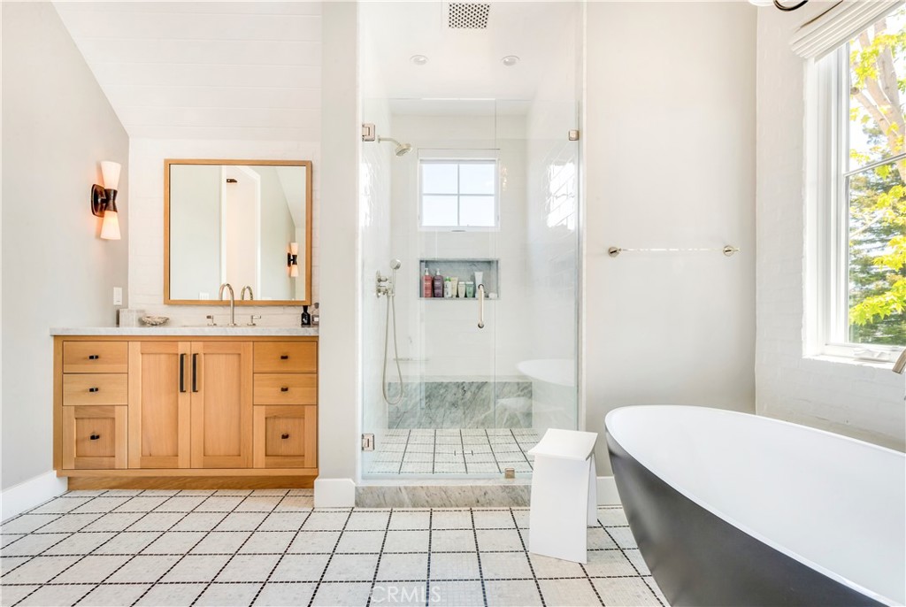 625 St James Road Newport Beach, CA 92663 - Photo 34 of 47 a spacious bathroom with a double vanity sink a toilet a mirror and shower