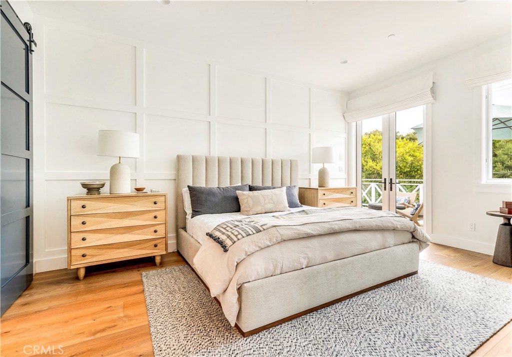 625 St James Road Newport Beach, CA 92663 - Photo 40 of 47 a bedroom with a bed and large window