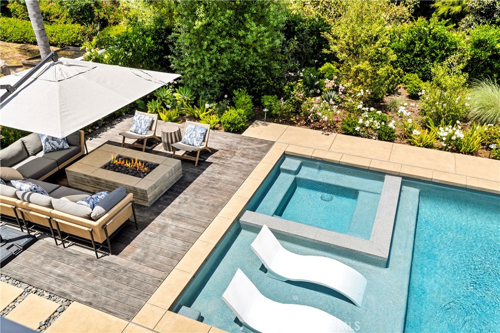 625 St James Road Newport Beach, CA 92663 - Photo 45 of 47 a view of a small deck with a bench