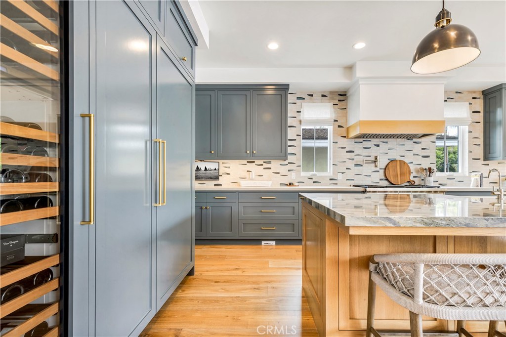625 St James Road Newport Beach, CA 92663 - Photo 8 of 47 a kitchen with stainless steel appliances granite countertop a sink and a refrigerator