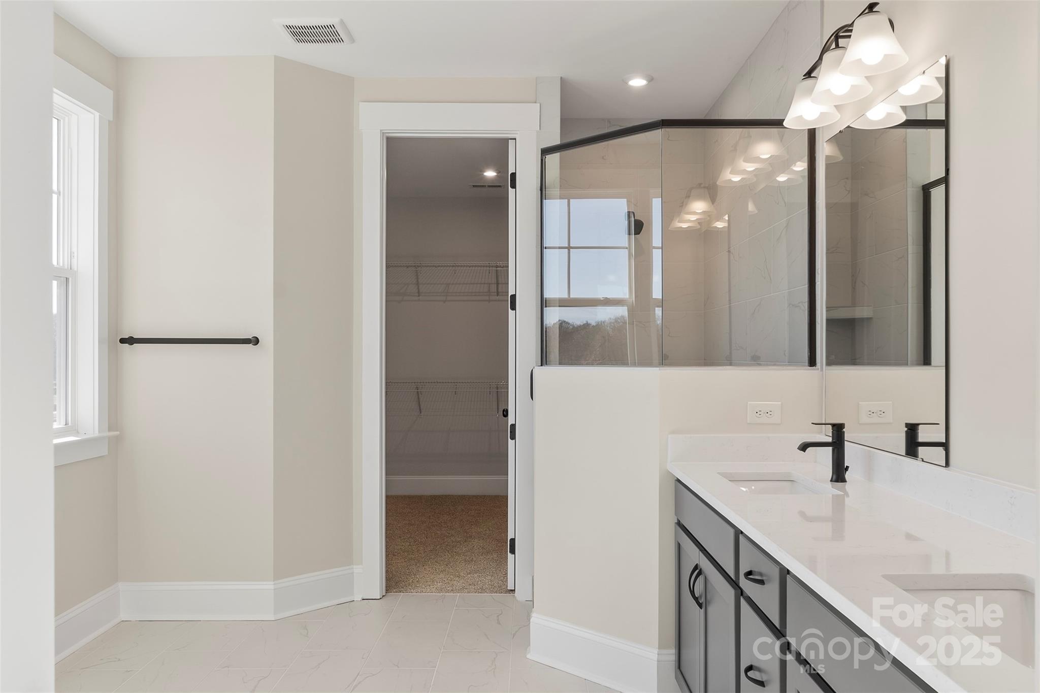 648 Digby Road, Unit 492 Rock Hill, SC 29730 - Photo 29 of 47 a bathroom with a double vanity sink and a mirror