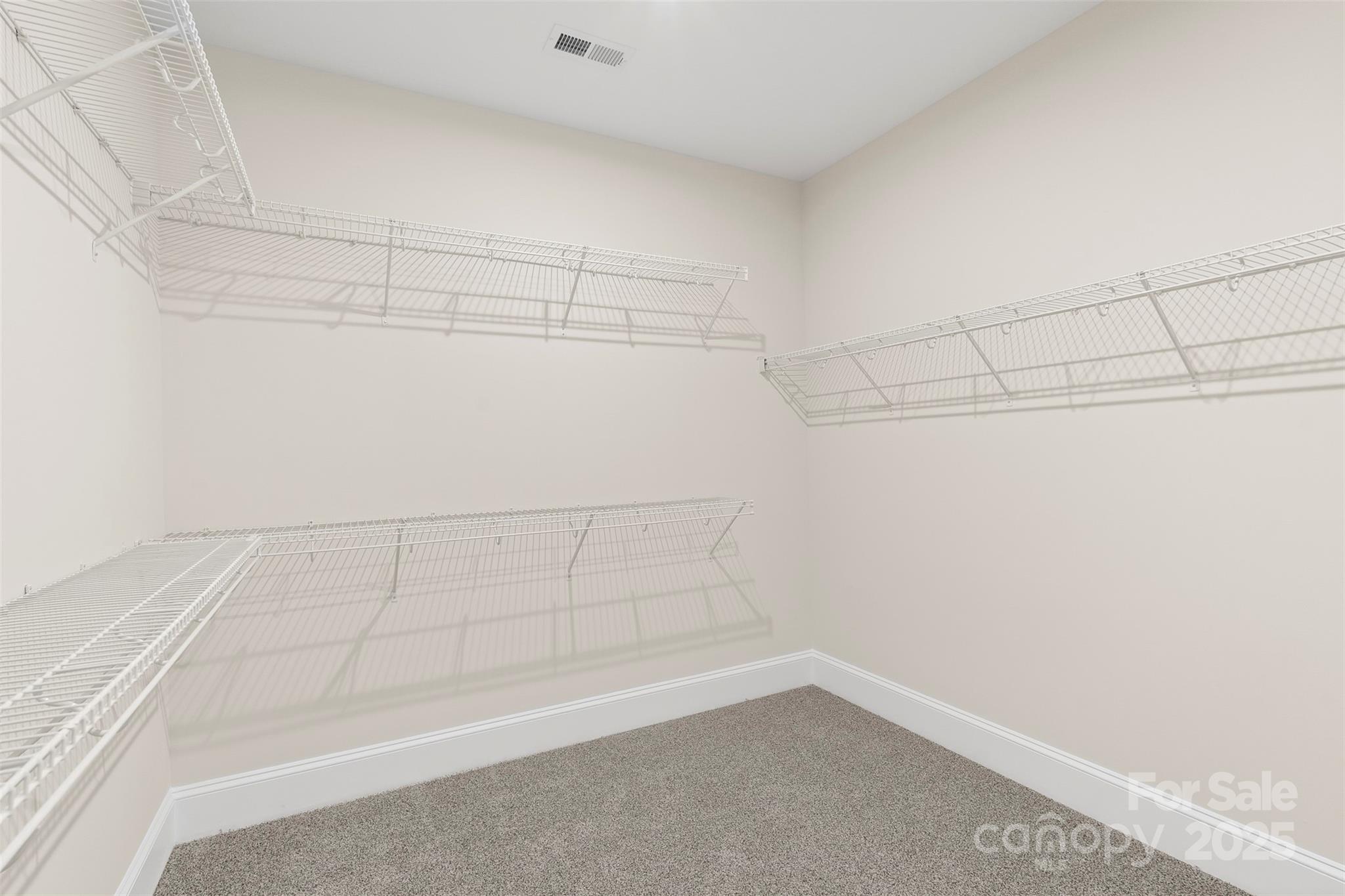 648 Digby Road, Unit 492 Rock Hill, SC 29730 - Photo 31 of 47 a view of a room with racks on the wall