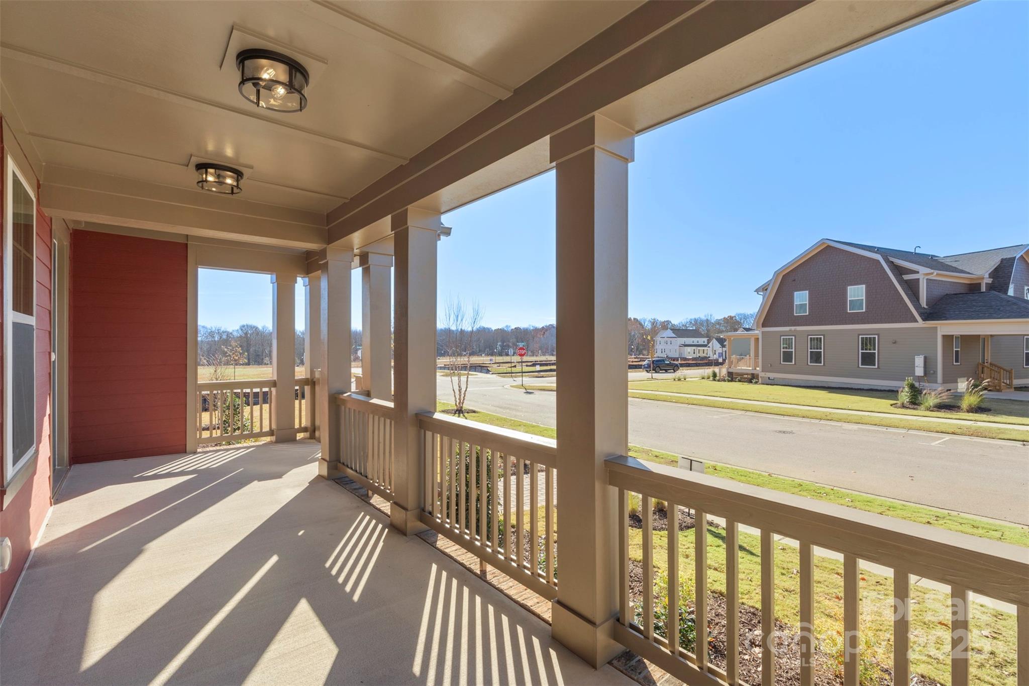 648 Digby Road, Unit 492 Rock Hill, SC 29730 - Photo 8 of 47 a view of a balcony with lake view and a floor to ceiling window