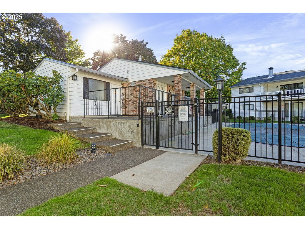 14850 Northeast Rose Parkway, Unit 67A Portland, OR 97230 - Photo 28 of 33 a view of a backyard with a garden and plants