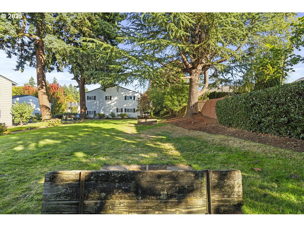 14850 Northeast Rose Parkway, Unit 67A Portland, OR 97230 - Photo 33 of 33 a backyard of a house with lots of green space