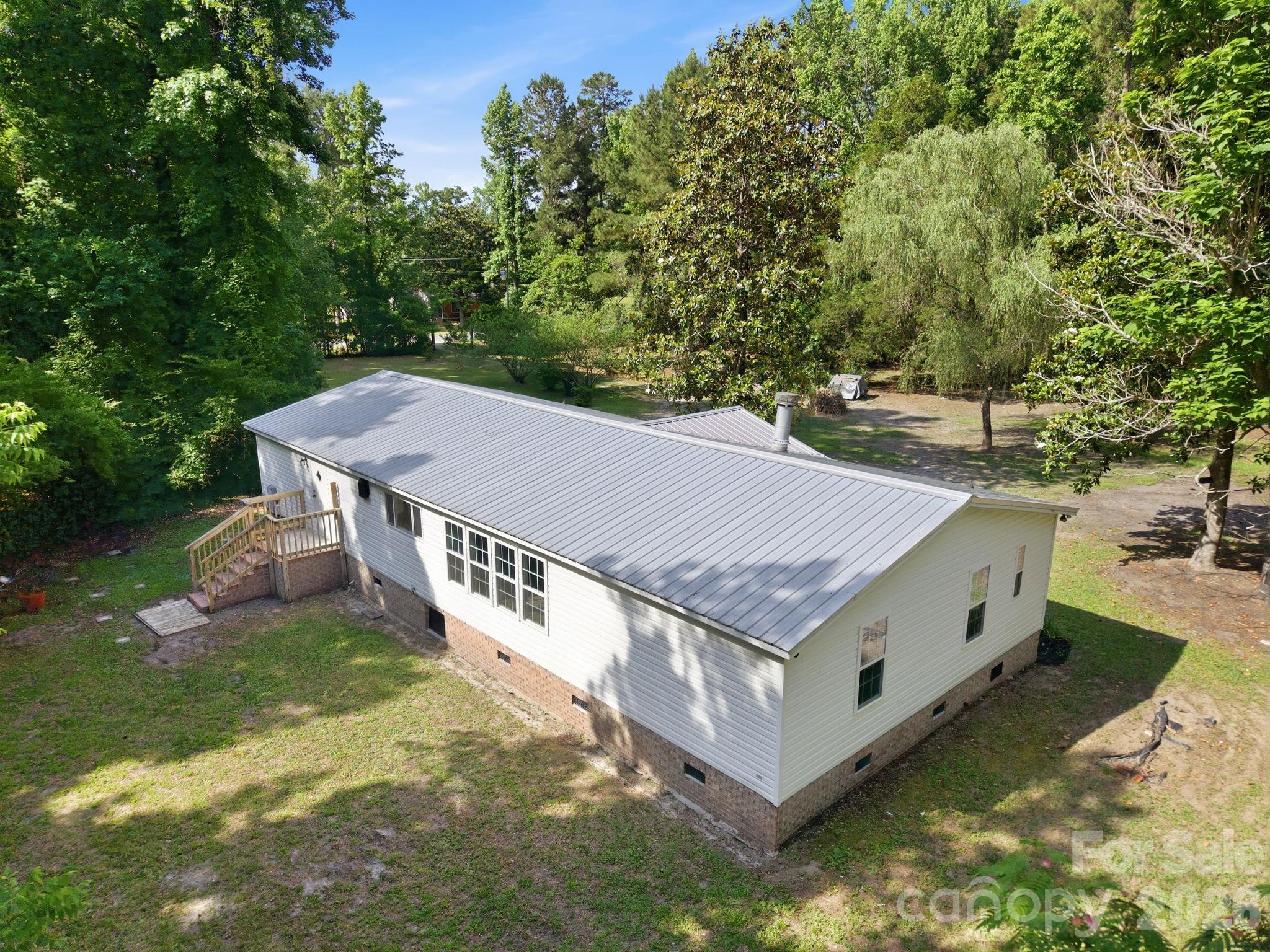 481 Harrell Road Burgaw, NC 28425 - Photo 18 of 25 an aerial view of a house with a yard
