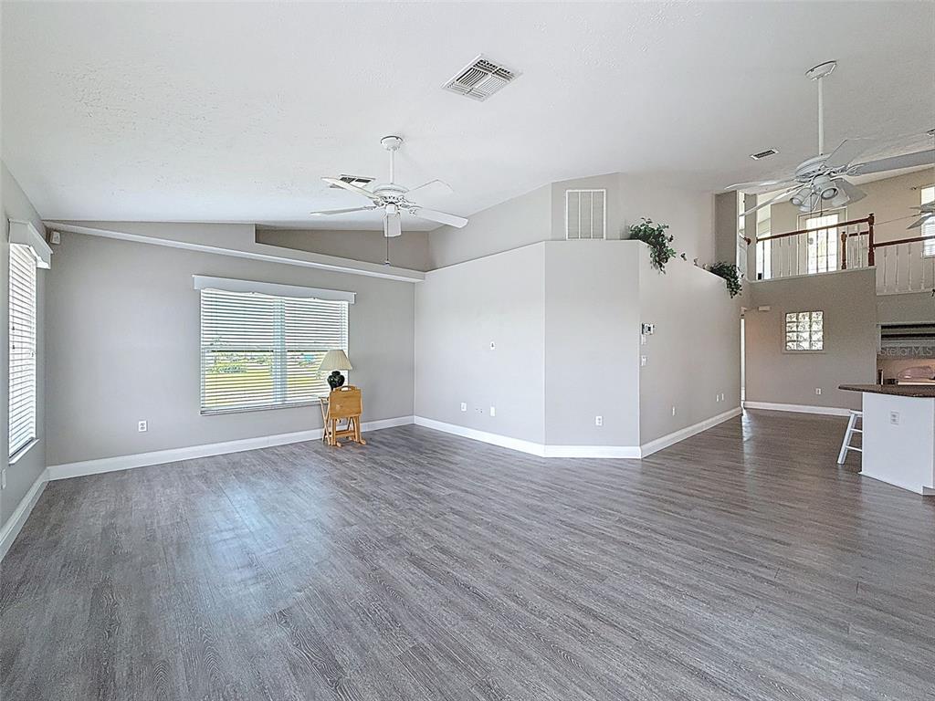 3342 Turks Cap Drive Hernando Beach, FL 34607 - Photo 26 of 100 a view of a room with wooden floor and window